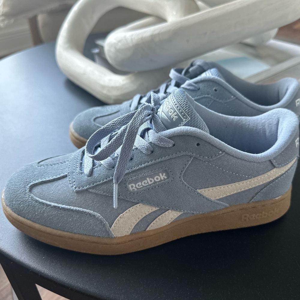 Blue suede Reebok sneakers